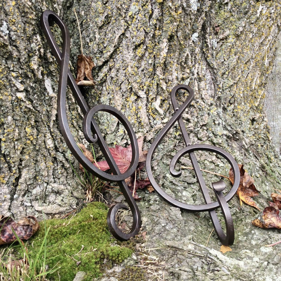 Our forged treble clefs are available as wall art or as a strong wall hook in brown or deep red finish