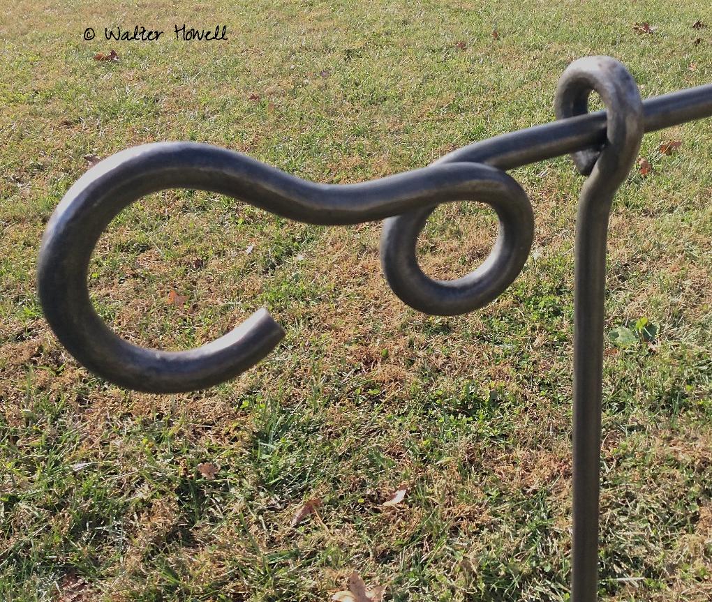 Walter forges the loop and hook for strength and ease of use.