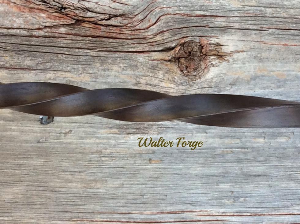 The barrel of our fire pokers have a traditional twist and a brown patina