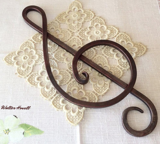 forged iron treble clef. Artisan piece of music inspired wall art. 15" x 6"